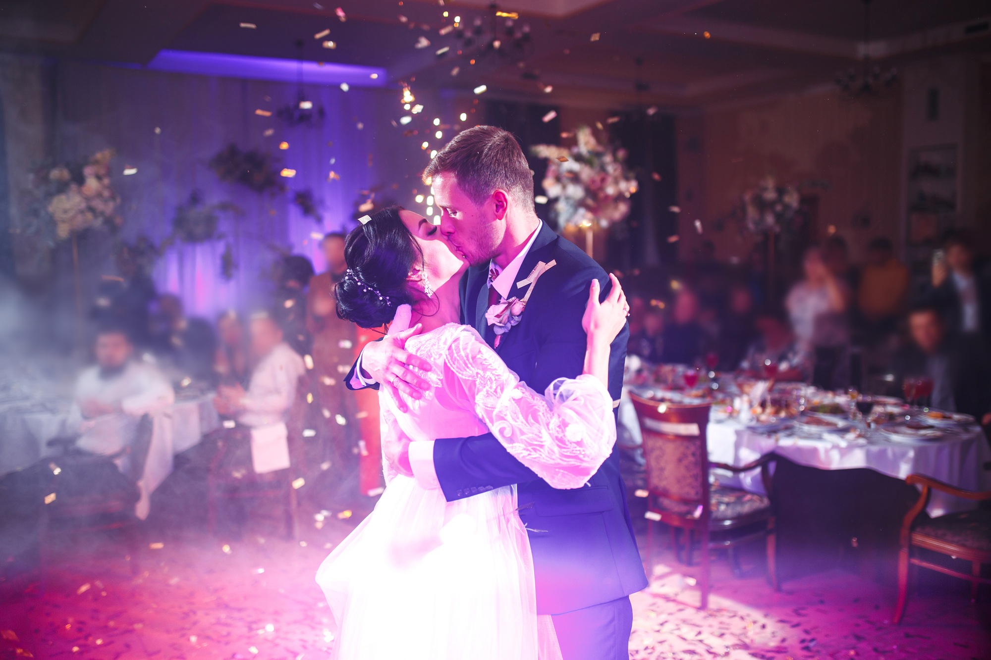 First wedding dance of newlywed. Happy bride and groom and their first dance in elegant restaurant.